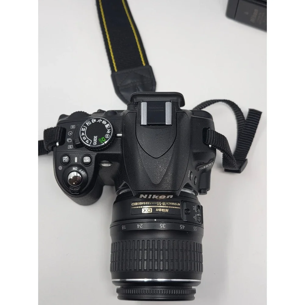 Nikon D3100 DSLR Camera Bundle 18-55mm 35mm 70-300mm Lenses Case Charger